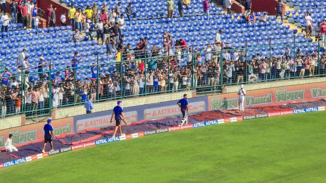 Football player celebrating a goal in a packed stadium
